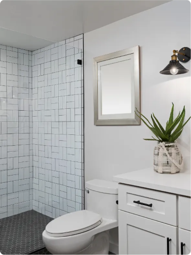 Bathroom remodel in Stoneham MA — gold fixtures