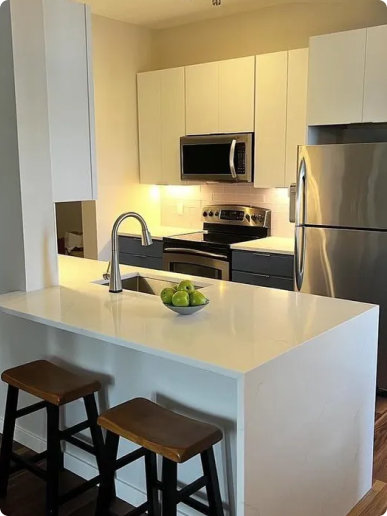 Marble waterfall kitchen island